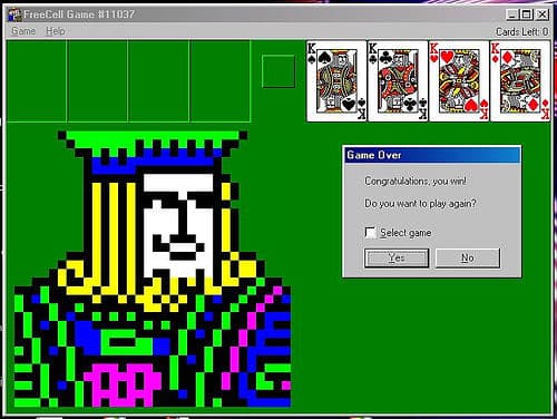 Screenshot of a completed FreeCell game showing a win message and stacked cards, representing the popular Windows version of the solitaire game.