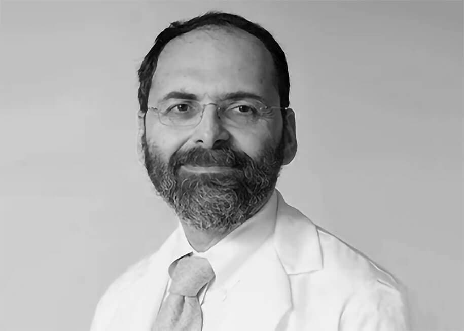 Black-and-white portrait of Paul Alfille, the creator of the first computerized FreeCell game developed on the PLATO system in 1978.